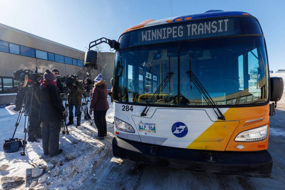 MIKE DEAL / FREE PRESS
 Erin Cooke, project manager for Winnipeg Transit's Transition to Zero Emission Bus program, speaks to reporters in front of a 40-foot fuel-cell battery-electric bus, the city's first zero-emission bus.